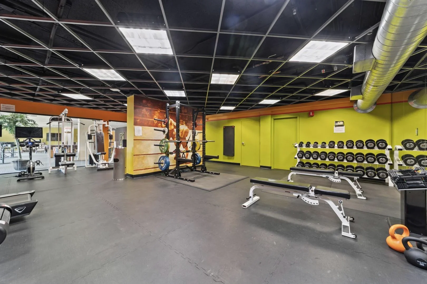 Citywalk shared fitness room with free weights and exercise machines