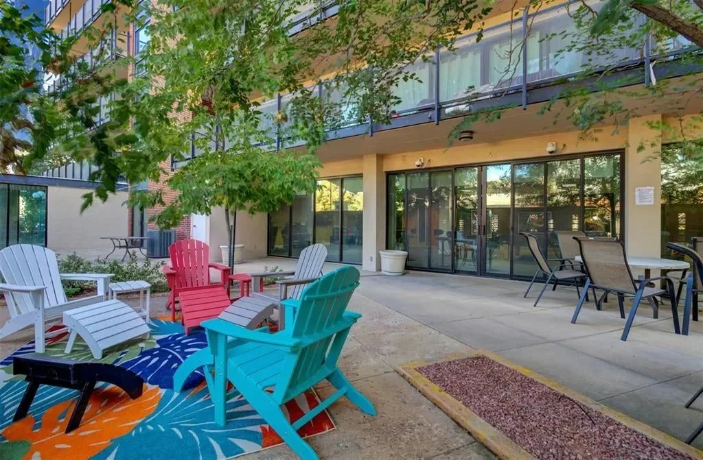 Citywalk’s shared outdoor patio with seating and tables